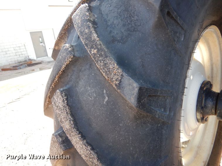 image for item LU9567 2009 New Holland T6020  MFWD tractor