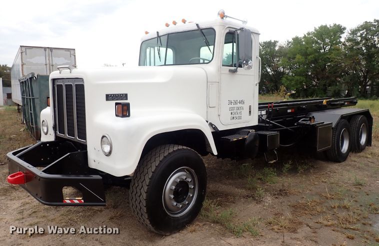 image for item DQ2942 1977 International Paystar 5000  roll-off container truck