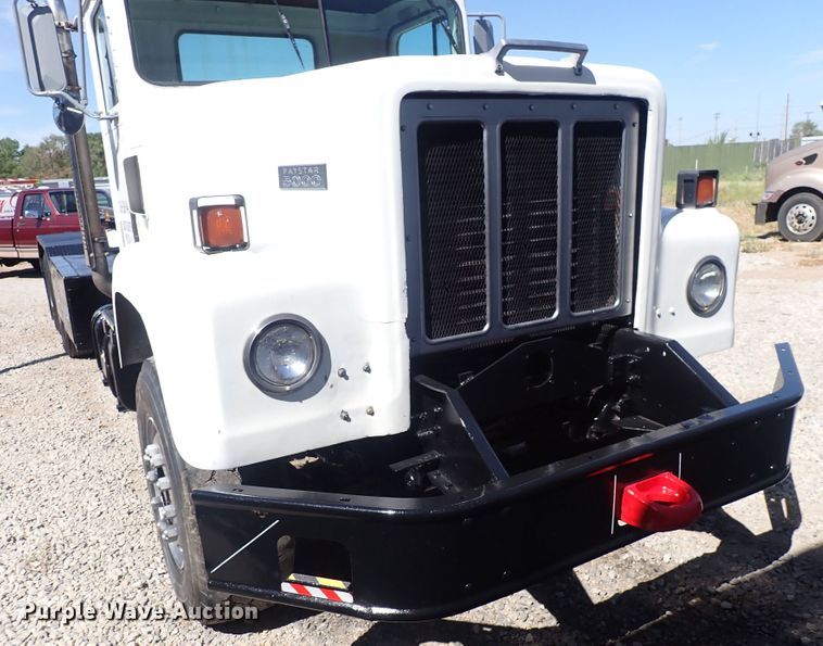 image for item DQ2942 1977 International Paystar 5000  roll-off container truck