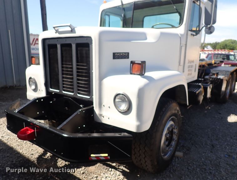 image for item DQ2942 1977 International Paystar 5000  roll-off container truck