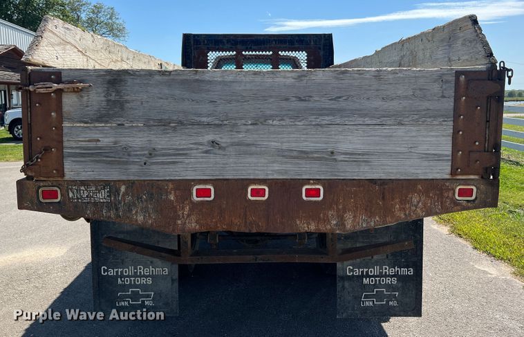 image for item MR9903 1999 Chevrolet C7500  dump flatbed truck