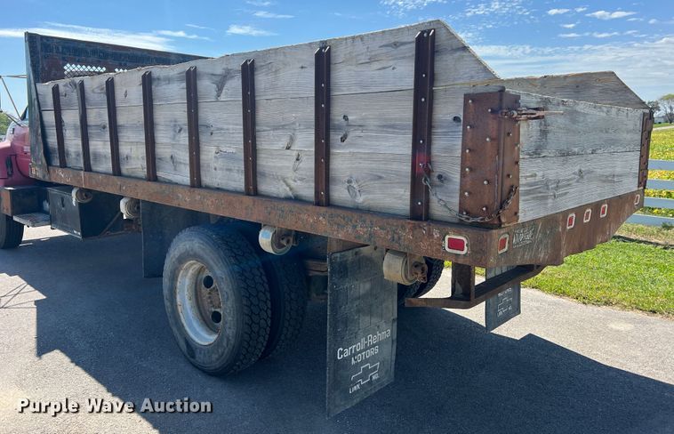 image for item MR9903 1999 Chevrolet C7500  dump flatbed truck