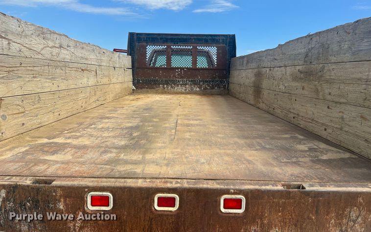 image for item MR9903 1999 Chevrolet C7500  dump flatbed truck