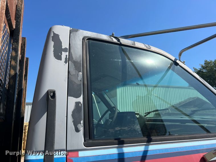 image for item MR9903 1999 Chevrolet C7500  dump flatbed truck