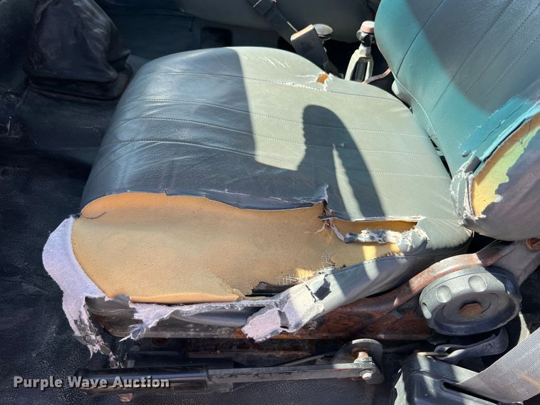 image for item MR9903 1999 Chevrolet C7500  dump flatbed truck