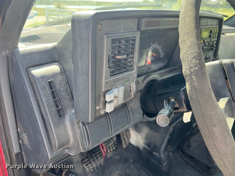 image for item MR9903 1999 Chevrolet C7500  dump flatbed truck