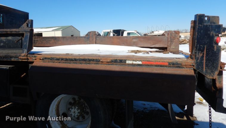 image for item DH8899 1995 International 4700  dump flatbed truck