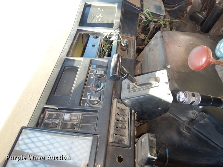 image for item DH8899 1995 International 4700  dump flatbed truck