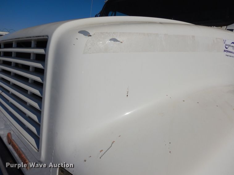 image for item DH8899 1995 International 4700  dump flatbed truck