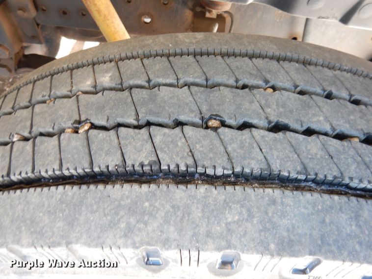 image for item DH8899 1995 International 4700  dump flatbed truck