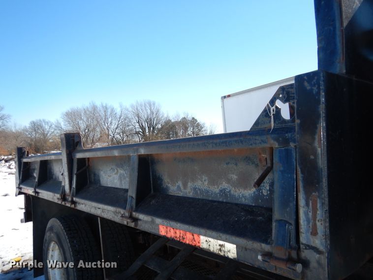image for item DH8899 1995 International 4700  dump flatbed truck