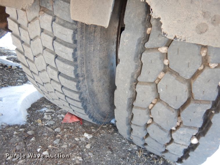 image for item DH8899 1995 International 4700  dump flatbed truck