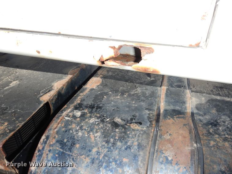 image for item DH8899 1995 International 4700  dump flatbed truck