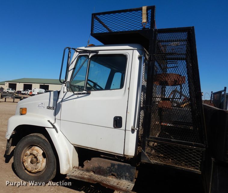 image for item DH8902 1998 Freightliner FL50  dump flatbed truck