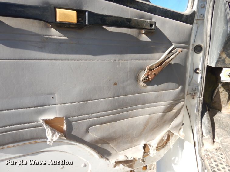 image for item DH8902 1998 Freightliner FL50  dump flatbed truck