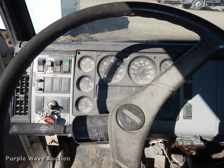 image for item DH8902 1998 Freightliner FL50  dump flatbed truck