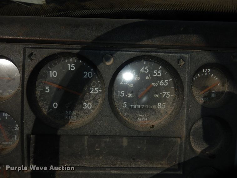 image for item DH8902 1998 Freightliner FL50  dump flatbed truck