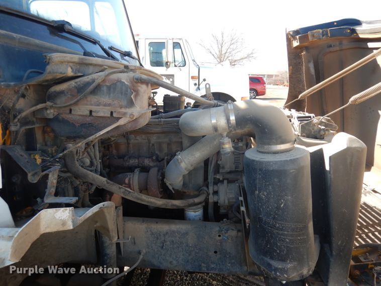 image for item DH8902 1998 Freightliner FL50  dump flatbed truck