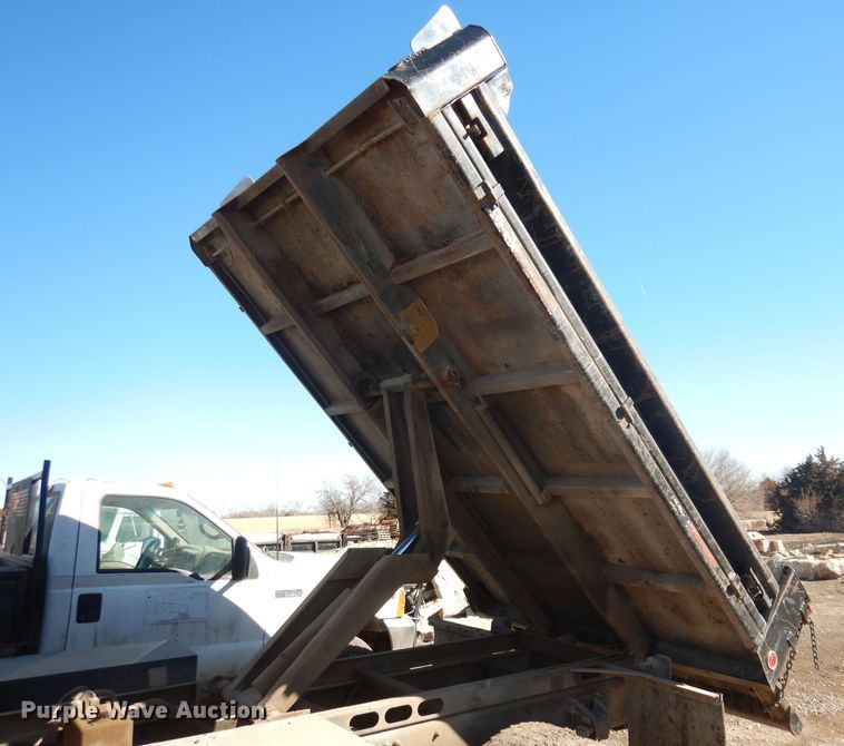 image for item DH8902 1998 Freightliner FL50  dump flatbed truck