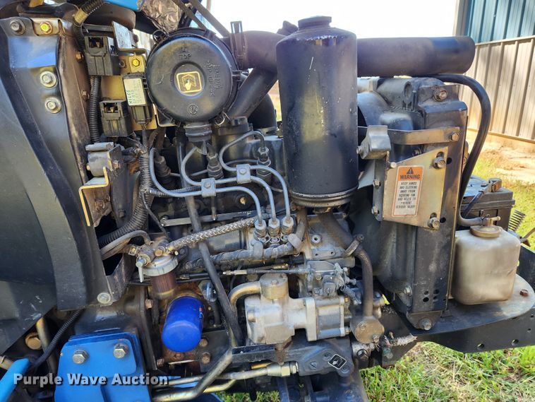 image for item MK9381 1999 New Holland TC21D  MFWD tractor