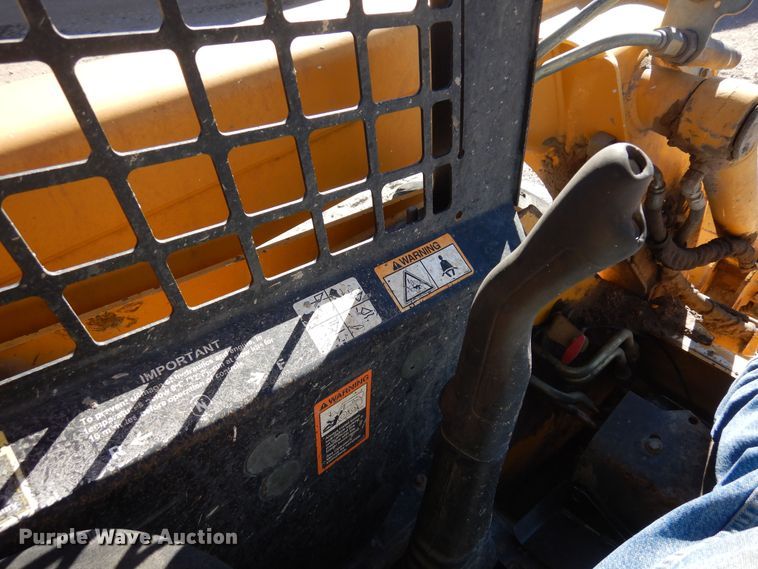 image for item DF8135 2009 John Deere 317  skid steer loader