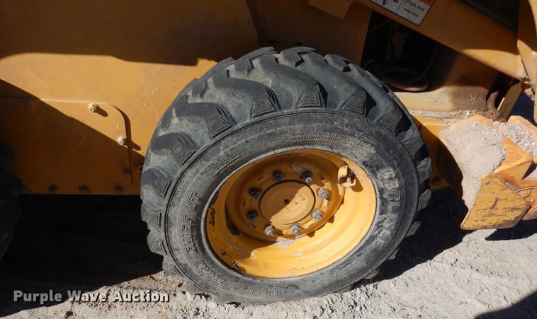 image for item DF8135 2009 John Deere 317  skid steer loader