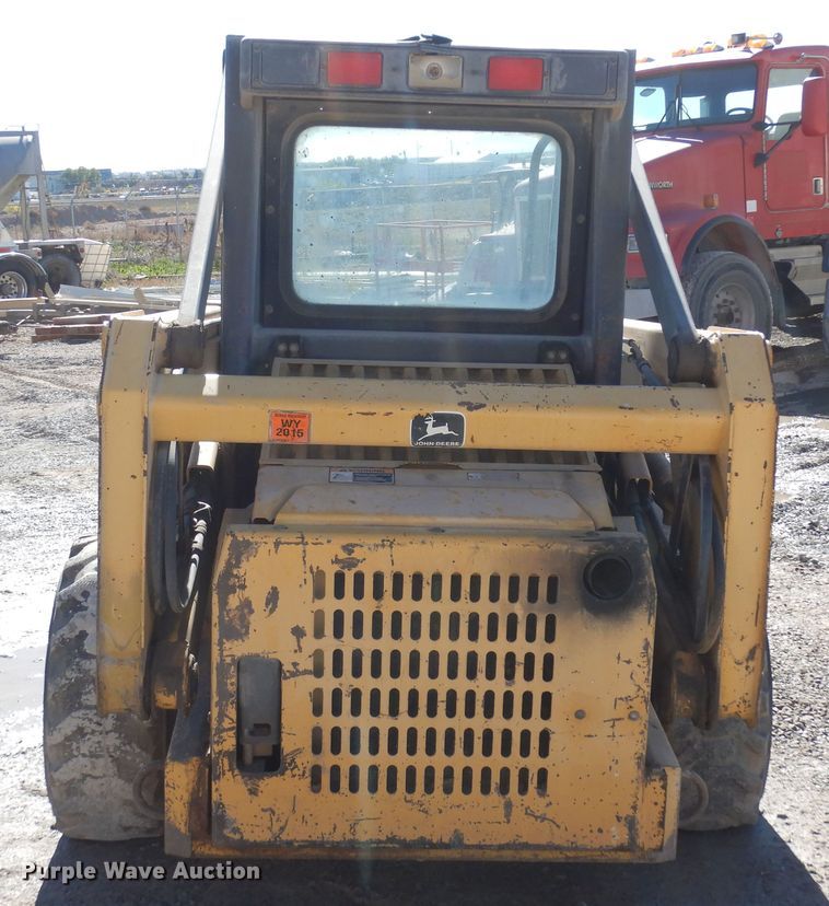 image for item DF8136 1995 John Deere 7775  skid steer loader