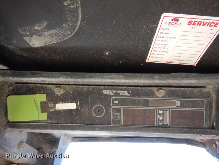 image for item DF8136 1995 John Deere 7775  skid steer loader