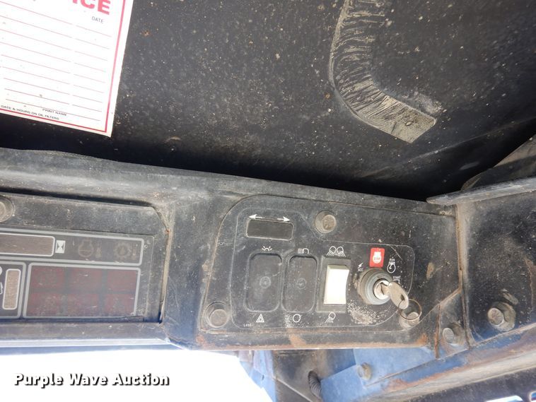 image for item DF8136 1995 John Deere 7775  skid steer loader