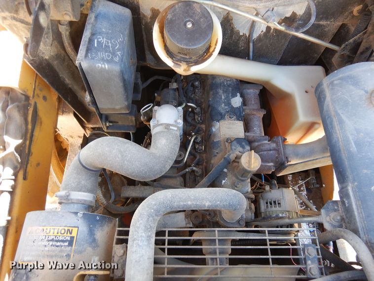 image for item DF8136 1995 John Deere 7775  skid steer loader