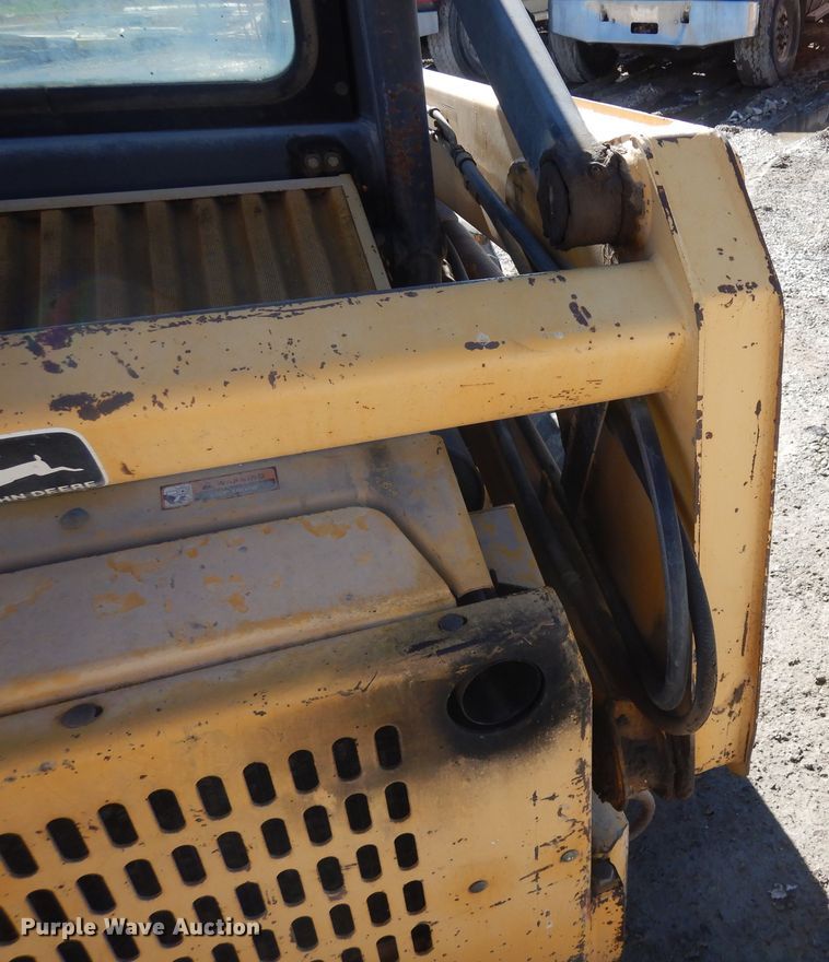 image for item DF8136 1995 John Deere 7775  skid steer loader