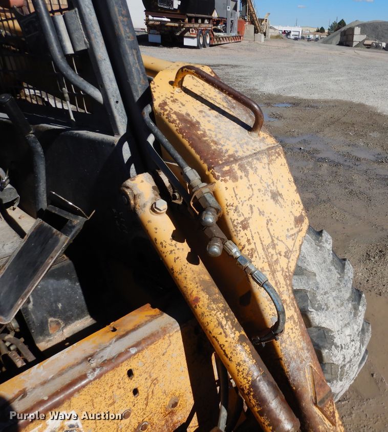 image for item DF8136 1995 John Deere 7775  skid steer loader