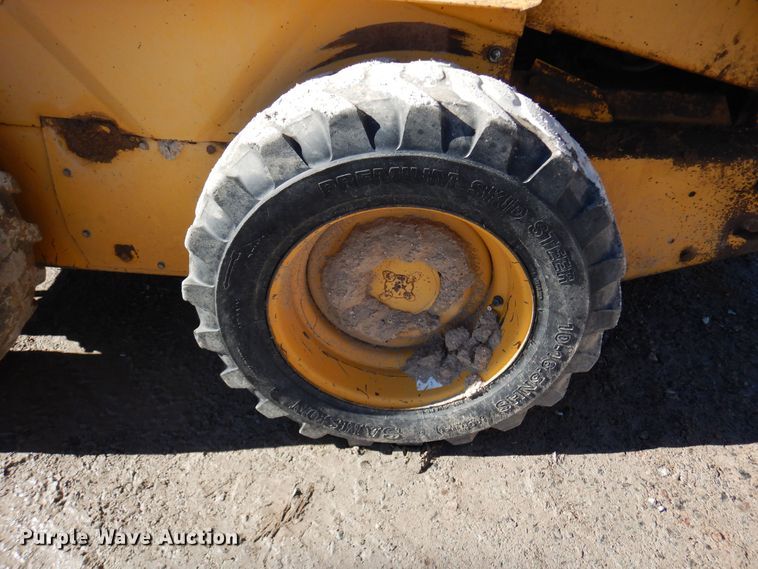 image for item DF8136 1995 John Deere 7775  skid steer loader