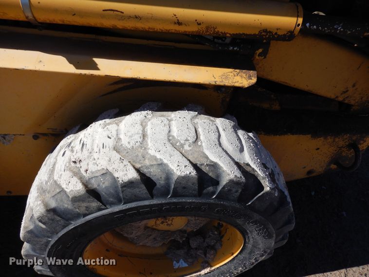 image for item DF8136 1995 John Deere 7775  skid steer loader