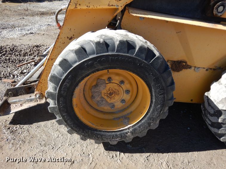 image for item DF8136 1995 John Deere 7775  skid steer loader