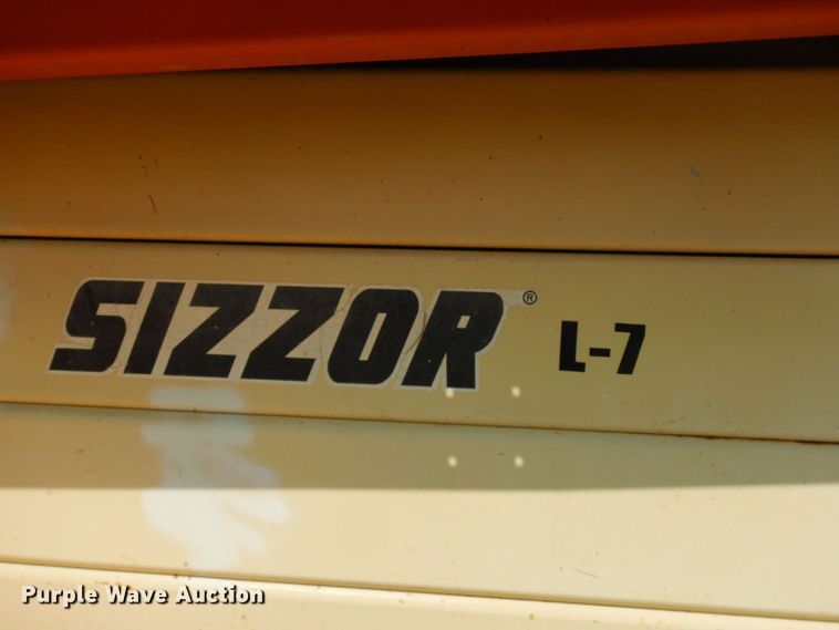 image for item HF9373 2000 JLG 500RTS  scissor lift