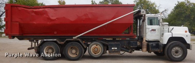 image for item HF9380 2004 Mack DM690S  roll-off container truck