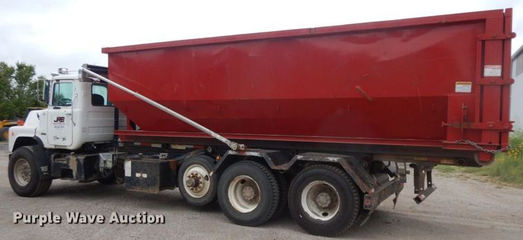 image for item HF9380 2004 Mack DM690S  roll-off container truck