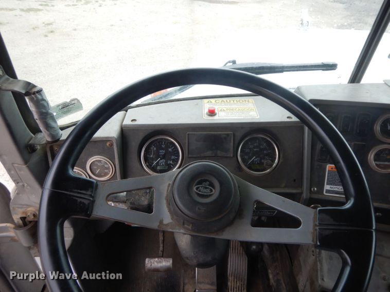 image for item HF9380 2004 Mack DM690S  roll-off container truck