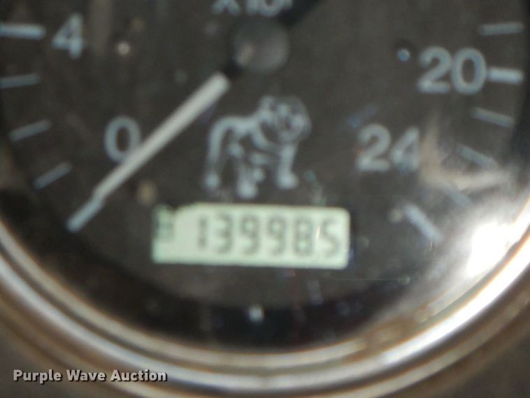 image for item HF9380 2004 Mack DM690S  roll-off container truck