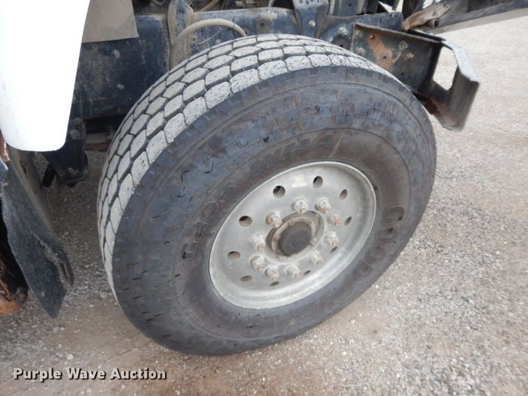 image for item HF9380 2004 Mack DM690S  roll-off container truck