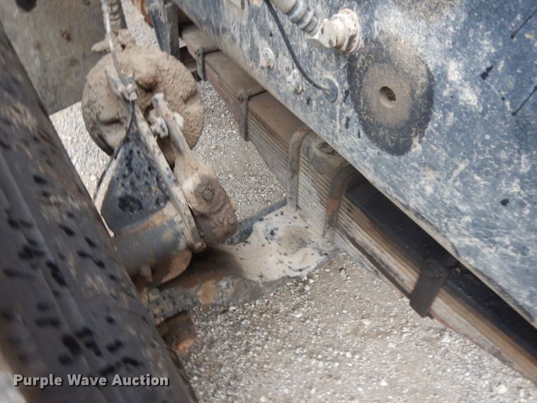 image for item HF9380 2004 Mack DM690S  roll-off container truck