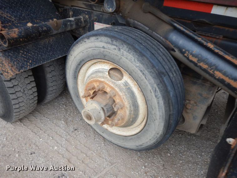 image for item HF9380 2004 Mack DM690S  roll-off container truck