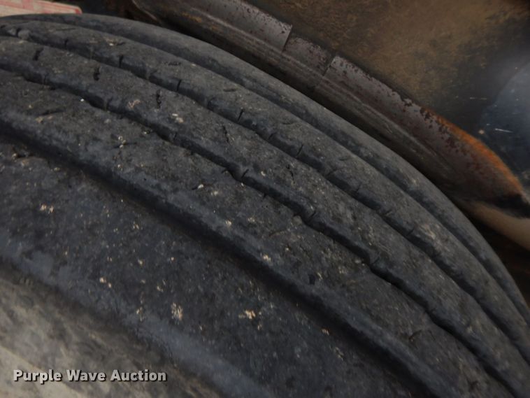 image for item HF9380 2004 Mack DM690S  roll-off container truck