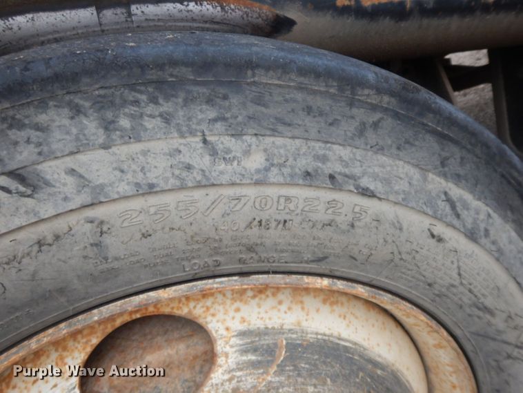 image for item HF9380 2004 Mack DM690S  roll-off container truck