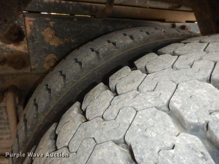 image for item HF9380 2004 Mack DM690S  roll-off container truck