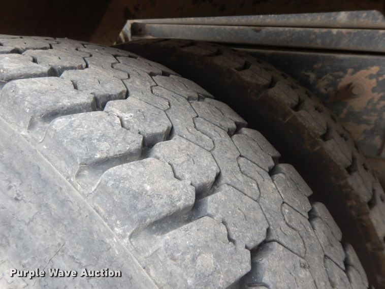 image for item HF9380 2004 Mack DM690S  roll-off container truck