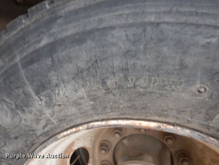 image for item HF9380 2004 Mack DM690S  roll-off container truck