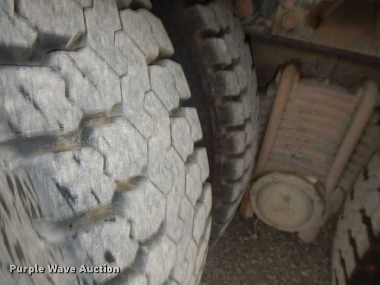 image for item HF9380 2004 Mack DM690S  roll-off container truck