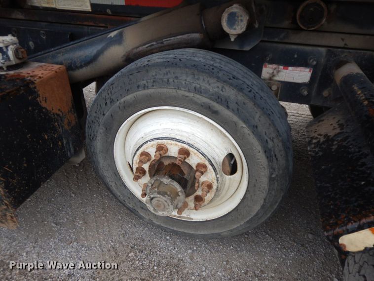 image for item HF9380 2004 Mack DM690S  roll-off container truck